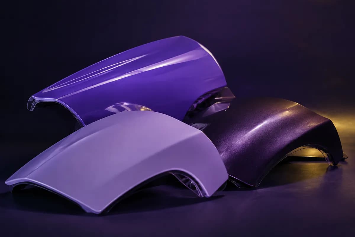 Richly colored protective film material studies with gloss and matte surface finishes.